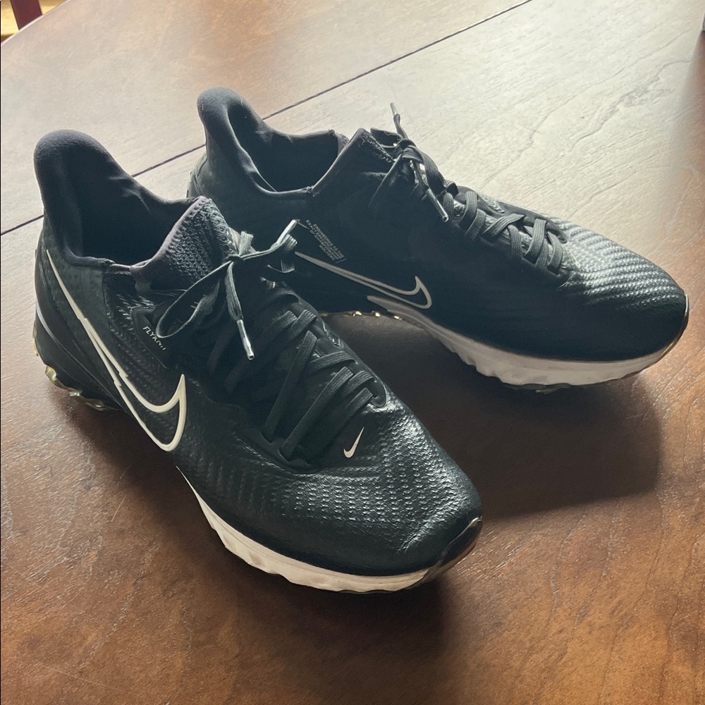 Nike 8.5w size Women’s Black and White Athletic Golf Shoes